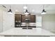 Kitchen featuring a central island, stainless steel appliances and sleek cabinetry at 789 Cielo Trl, Kissimmee, FL 34759