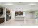 Spacious kitchen featuring stainless steel appliances, a large island, and ample cabinet space at 789 Cielo Trl, Kissimmee, FL 34759