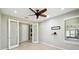 Home office featuring a ceiling fan, recessed lighting, modern windows, and glass paned doors at 789 Cielo Trl, Kissimmee, FL 34759