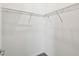 Empty walk-in closet features wire shelving for maximizing storage and organization at 789 Cielo Trl, Kissimmee, FL 34759
