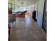 Sunroom featuring a jacuzzi and tiled flooring at 13 Dorset Dr, Kissimmee, FL 34758
