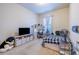 Comfortable bedroom with natural light and a dedicated study area at 3301 Whitestone Cir # 203, Kissimmee, FL 34741