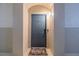 Stylish front door with a 'Welcome' mat, sidelights, and a secure entry system at 3301 Whitestone Cir # 203, Kissimmee, FL 34741