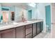 Bathroom featuring double sinks and granite countertops offering ample space at 363 Bella Cortina Dr, Kissimmee, FL 34759