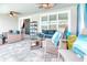 Relaxing lanai with cushioned furniture, ceiling fans, and patio at 363 Bella Cortina Dr, Kissimmee, FL 34759