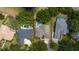 Aerial view of a single-Gathering home featuring a private pool within a fenced backyard at 9509 Baycliff Ct, Orlando, FL 32836