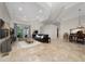 Spacious living room showcases tile floors, recessed lighting, and stylish decor at 9509 Baycliff Ct, Orlando, FL 32836