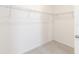 Empty walk-in closet with shelving at 1180 Lone Palm Way, St Cloud, FL 34771
