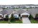 Charming one-story home with a two-car garage and neatly manicured landscaping at 1271 Yorkshire Ct, Davenport, FL 33896