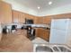 Fully equipped kitchen with stainless steel appliances, ample counter space, and modern finishes at 141 Summer Place Loop, Clermont, FL 34714