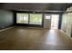 Spacious living room with large windows offering natural light and scenic views at 1512 Ison Ln, Ocoee, FL 34761