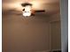Bedroom features a ceiling fan and closet at 2804 Club Cortile Cir # A, Kissimmee, FL 34746