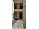 Condo exterior with a private balcony and well-maintained landscaping offering a welcoming entrance at 2804 Club Cortile Cir # A, Kissimmee, FL 34746