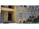 Charming condo exterior with well-maintained landscaping and ample natural light, creating an inviting atmosphere at 2804 Club Cortile Cir # A, Kissimmee, FL 34746