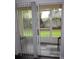 View of patio and enclosed porch at 2804 Club Cortile Cir # A, Kissimmee, FL 34746