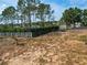 Spacious backyard area featuring both chain link and white fencing for added privacy at 629 N 7Th St, Lake Wales, FL 33853
