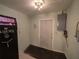 Basement featuring painted walls, exterior door and gun safe at 629 N 7Th St, Lake Wales, FL 33853