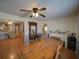 Spacious dining room featuring a large wooden table and decorative fireplace at 629 N 7Th St, Lake Wales, FL 33853