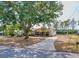 Charming single-story home with mature trees and a driveway at 629 N 7Th St, Lake Wales, FL 33853