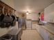 Bright kitchen features white cabinets, stainless steel refrigerator, and an adjacent dining space at 629 N 7Th St, Lake Wales, FL 33853