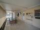 Outdoor patio featuring ample seating, a ceiling fan, and natural light at 629 N 7Th St, Lake Wales, FL 33853