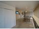 Enclosed patio with dining set, a TV, and storage, ideal for outdoor entertainment and relaxation at 629 N 7Th St, Lake Wales, FL 33853