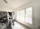 Bright home exercise area with exercise equipment and window letting in natural light at 6922 Doehring Dr, Lakeland, FL 33810