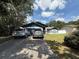 Charming single-story home featuring well-maintained landscaping and an attached garage at 6922 Doehring Dr, Lakeland, FL 33810