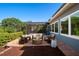Outdoor patio with comfortable seating and a modern fire pit perfect for entertaining at 8352 Lookout Pointe Dr, Windermere, FL 34786