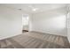 Bedroom with neutral carpet and a view of the bathroom at 8352 Lookout Pointe Dr, Windermere, FL 34786