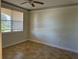 Bright bedroom with a window that brings in natural light and tile flooring at 2550 Bella Vista Dr, Davenport, FL 33897