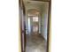 Light and bright foyer with tile floors, high ceilings, arched entryway and direct views of the living space at 2550 Bella Vista Dr, Davenport, FL 33897