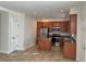 Well-equipped kitchen featuring wood cabinets, stainless steel appliances, and center island at 2550 Bella Vista Dr, Davenport, FL 33897