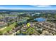 An aerial shot showcases the home’s location amongst serene water features and green spaces at 265 Del Sol Ave, Davenport, FL 33837