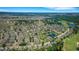 An aerial view of the community shows proximity to ponds and local golf course at 265 Del Sol Ave, Davenport, FL 33837