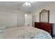 Bedroom featuring neutral carpeting and closet and dresser at 265 Del Sol Ave, Davenport, FL 33837