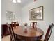 Bright dining room with traditional accents and warm paint at 265 Del Sol Ave, Davenport, FL 33837