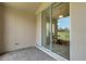 Outdoor patio with brick flooring offers a view through sliding glass doors at 265 Del Sol Ave, Davenport, FL 33837