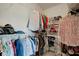 Well-organized walk-in closet with ample hanging space and shelving at 265 Del Sol Ave, Davenport, FL 33837