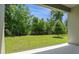 Backyard featuring green grass and many trees at 317 Alexandrite St, Deland, FL 32720
