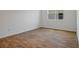 Clean, empty bedroom with tile floors and a window for natural light at 317 Alexandrite St, Deland, FL 32720