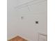 Interior laundry room with tile floors and shelving at 317 Alexandrite St, Deland, FL 32720
