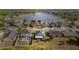 Aerial view of the neighborhood, with a pond and fountain visible at 3633 Bristol Cove Ln, St Cloud, FL 34772