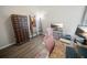 Brightly lit bedroom with vinyl flooring and ceiling fan, ideal for home office at 3633 Bristol Cove Ln, St Cloud, FL 34772