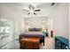 Spacious main bedroom featuring an ensuite bathroom, natural light, and walk-in closet at 3633 Bristol Cove Ln, St Cloud, FL 34772