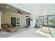 Relaxing covered patio with ceiling fan, wicker furniture, and a view of the backyard at 3633 Bristol Cove Ln, St Cloud, FL 34772