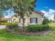Charming single-Gathering home with well-manicured landscaping and decorative shutters adding to the curb appeal at 644 Shorehaven Dr, Kissimmee, FL 34759