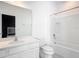 Bright bathroom featuring a shower-tub combination, a modern vanity, and a clean, well-lit space at 1326 Butterfly Orchid Rd, Davenport, FL 33837