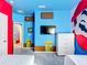 Themed bedroom with Mario decor, television and dresser at 1326 Butterfly Orchid Rd, Davenport, FL 33837