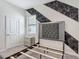 Stylish bedroom features modern accents, a decorative headboard, and bright natural light, creating a relaxing space at 1326 Butterfly Orchid Rd, Davenport, FL 33837
